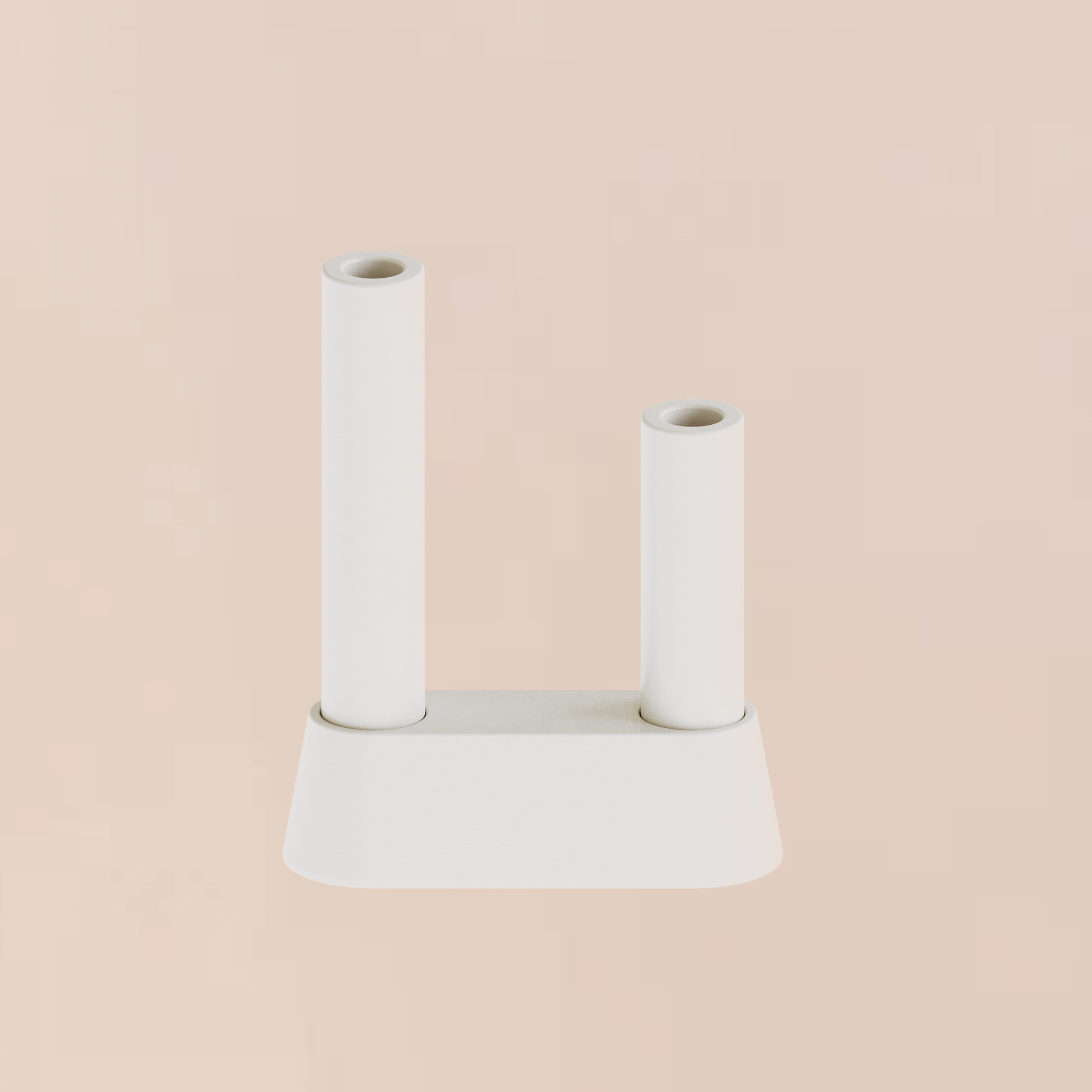 CAST sculptural plaster double pillar candle holder with low chamfered base styled as a minimalist homeware object on a soft backdrop