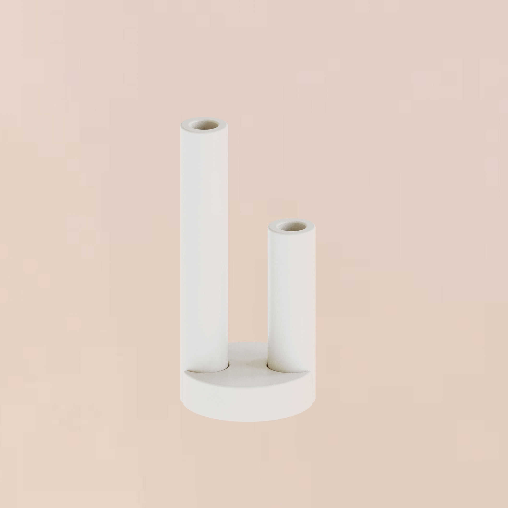 CAST sculptural plaster double pillar candle holder with moon base styled as a minimalist homeware object on a soft peach backdrop